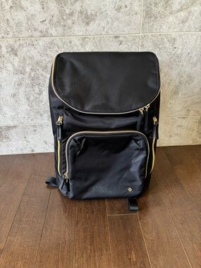 Black Samsonite Backpack with Gold Accents